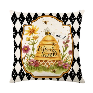 Honey bee pillow cover with floral honeycomb design and black white diamond border