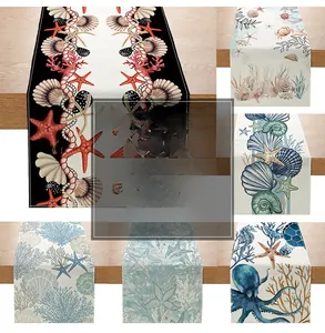 Detail view of summer ocean themed table runners with octopus and starfish patterns