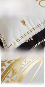 Close-up of soft short plush fabric with premium gold foil crown pattern detail