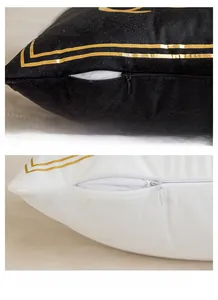 Detail of hidden zipper design on black and white velvet pillow covers with gold print