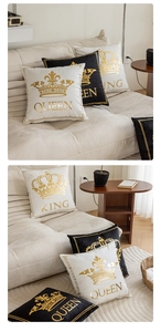 Detail of King and Queen crown gold foil print on plush black and white throw pillow covers