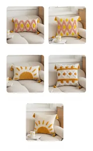 Close-up of tufted geometric diamond patterns and yellow tassels on boho cushion covers
