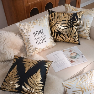 Fodere per cuscini di lusso in nero e bianco con foglie dorate e testo Home Sweet Home