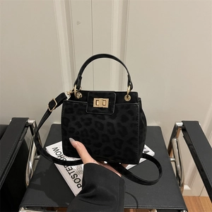 Fashion leopard print handbag for women with gold twist lock and adjustable shoulder strap