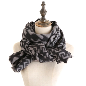 Detailed close-up of double-sided maze pattern scarf with vintage frayed edges on mannequin