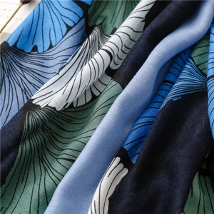 Close-up detail of lightweight cotton-linen scarf with vintage ginkgo leaf prints