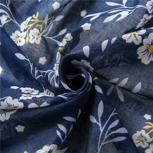 Close-up of bohemian floral cotton linen scarf showing soft texture and detailed print