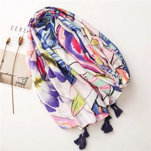 Colorful floral print cotton linen scarf with elegant navy blue tassels on white background