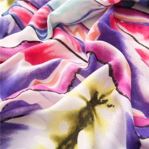 Detailed macro view of colorful floral pattern on soft cotton linen sun protection scarf