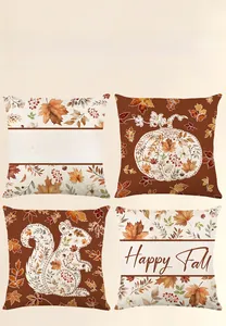 Detail of four autumn maple leaf and pumpkin print decorative polyester pillow covers