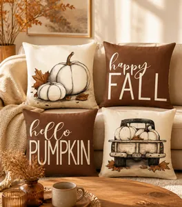 Lot de quatre housses de coussin d'automne avec citrouilles et texte Happy Fall