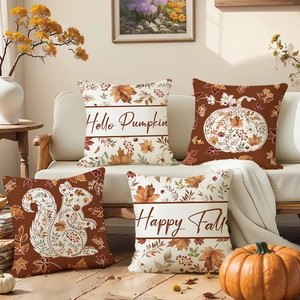 Set of four autumn pillow covers with pumpkin and maple leaf prints for fall home decor