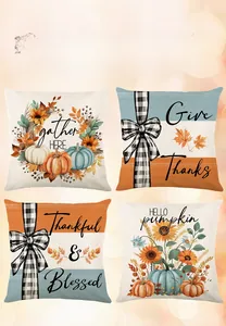 Detail view of four Thanksgiving pillow covers with pumpkin and floral prints