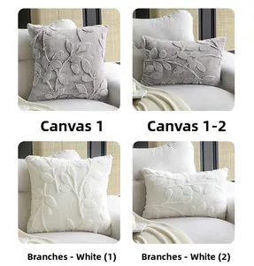 Detail view of plush leaf pattern cushion covers in grey and white color options
