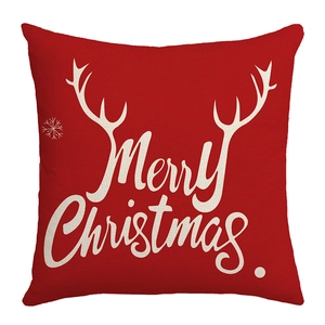 Red Christmas pillowcase with Merry Christmas text and reindeer antlers on fabric