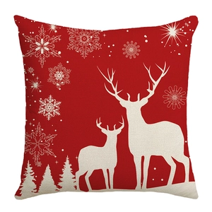 Red Christmas pillowcase with white reindeer silhouettes and snowflake patterns