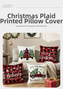 Detail of four Christmas red and black buffalo plaid pillow covers on a cozy sofa