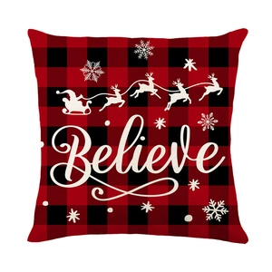 Christmas buffalo plaid pillow case featuring Santa sleigh and Believe text print