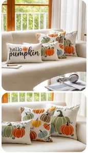 Détail de housses de coussin brodées de citrouilles avec texte Hello Pumpkin et Happy Fall
