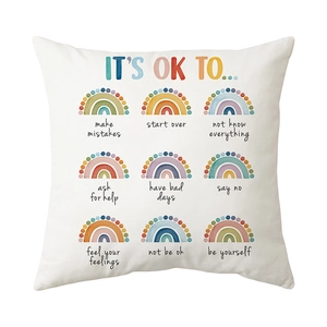 White square cushion cover with 3x3 rainbow grid and motivational quotes on plush fabric