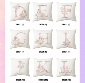 Grid view of white square pillowcases with rose gold letters D to L and floral decor