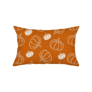 Orange lumbar pillow cover with white pumpkin print of white pumpkin sketches on woven fabric texture