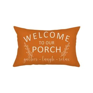 Terracotta pumpkin lumbar pillow case with Welcome to Our Porch white lettering print