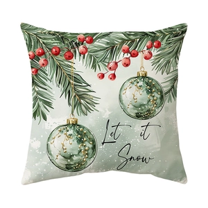Christmas pillow cover with Let it Snow text, pine branches, berries and green ornaments