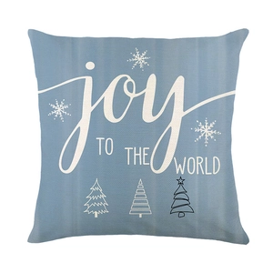 Blue Christmas pillow cover with Joy to the World text and snowflake graphic prints