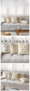 Boho tassel cushion cover with tufted geometric patterns on creamy white cotton fabric