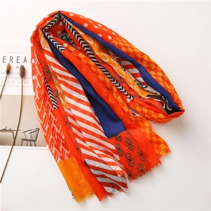 Bohemian orange cotton linen scarf with geometric colorful patterns and fringe edge