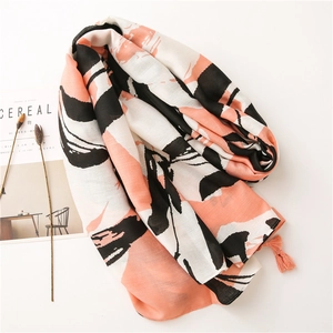Artistic cotton linen scarf with pink color blocking, tassels, and abstract print