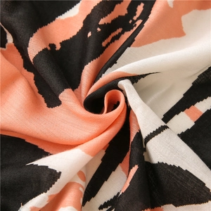 Linen cotton scarf with geometric orange-pink color block and soft woven texture