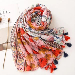 Detailed swirl layout of pink floral cotton linen scarf with soft fringe edges