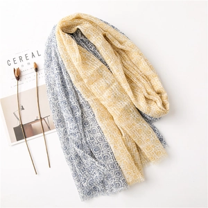 Elegant summer cotton linen scarf with geometric floral pattern and frayed edges