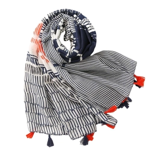 Women's cotton linen scarf with geometric navy and orange patterns and fringe edges