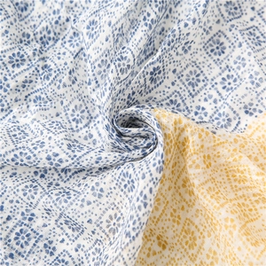 Close-up of vintage geometric floral pattern on lightweight cotton linen scarf