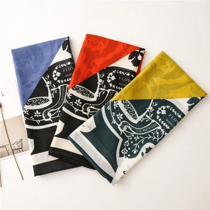 Elegant graffiti print long scarf with floral and geometric patterns in blue and yellow