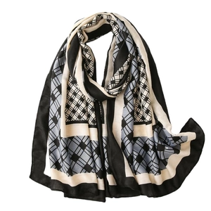 Plaid cotton linen feel scarf with black, grey and cream geometric checkerboard pattern