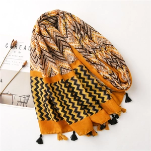 Bohemian zigzag geometric pattern scarf with fringe tassels on minimalist background
