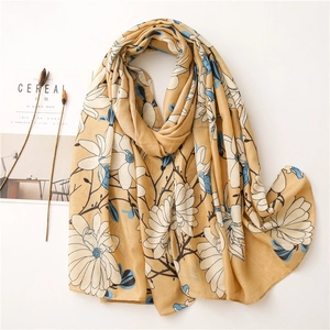Lightweight cotton linen long scarf with large white magnolia floral print in ginger yellow
