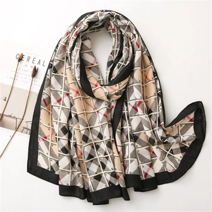 Retro geometric patchwork scarf with polka dots and red plaid on a clean white background