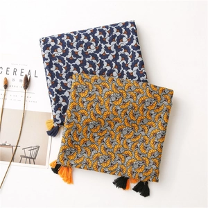 Ethnic cotton-linen scarf with floral print and tassels, blue and yellow colorways