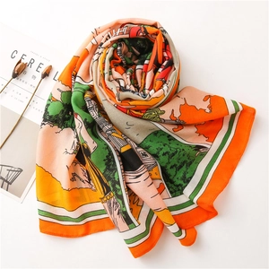 Detail of artistic cotton linen scarf with colorful hand-painted travel scenery patterns