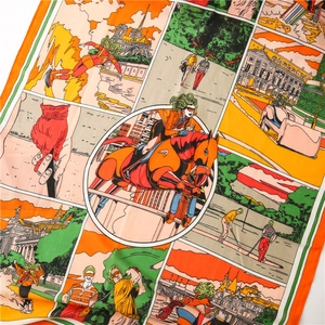 Close-up of comic-style printed scarf featuring equestrian and architecture scenes