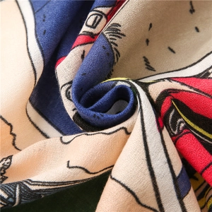 Detailed close-up of the cotton-linen scarf fabric showing intricate weaving and soft texture