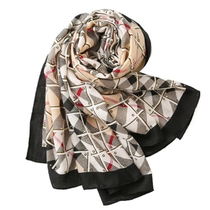 Beige cotton linen scarf with black geometric grid and red accents for summer travel