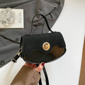Borsa a tracolla retrò in pelle nera e camoscio con chiusura circolare dorata