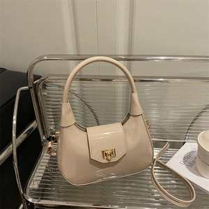 Chic beige patent leather hobo bag with gold clasp and detachable strap for women