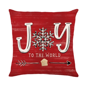 Roter Weihnachtskissenbezug mit weißem Joy to the World Druck und Schneeflocken